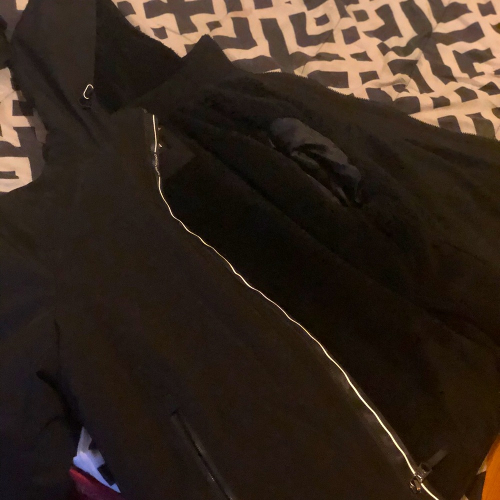 Calvin Klein coat and men’s bag